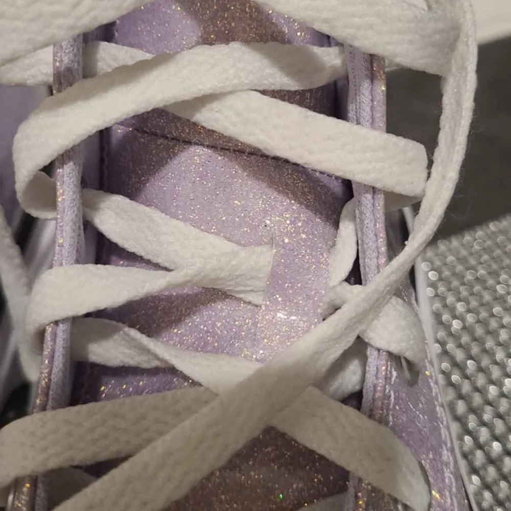 Converse Purple High-Top Sneakers with Canvas Upper
